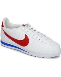 nike cortez black and white suede