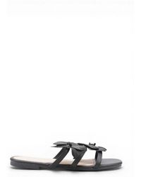 La Modeuse - Sandales plates Tongs, mules pour - Noir - Lyst