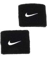 Nike - Accessoire sport Swoosh wristband - Lyst