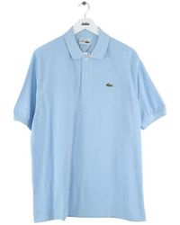 Lacoste - T-shirt Polo en coton bleu - Lyst