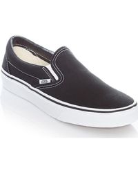 black white slip ons
