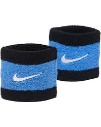 Nike - Accessoire sport swoosh wristbands 2 pk - Lyst