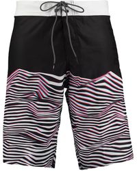PUMA PERFORMANCE Fietsbroek Met Labelprint in het Zwart Dames Kleding voor voor Shorts voor Knielange en lange shorts 