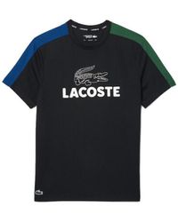 Lacoste - T-shirt T-SHIRT TENNIS ULTRA-DRY COLOR-BLOCK IMPRIMÉ NOIR BL - Lyst