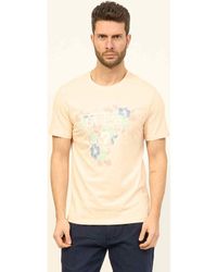 Guess - T-shirt T-shirt à col rond en coton avec logo imprimé - Lyst