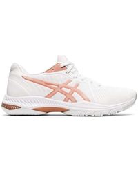 orange netball trainers