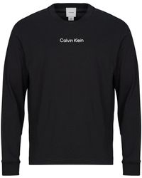 Calvin Klein - T-Shirts A Maniche Lunghe Ls Rlxd Standard Logo Crewnk Tee - Lyst