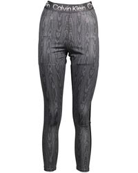 élégants et chinos Leggings Femme Vêtements Pantalons décontractés Leggings Synthétique Calvin Klein en coloris Noir 