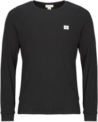 Calvin Klein - T-Shirts A Maniche Lunghe Ls Waffle Badge Crewnk Tee - Lyst
