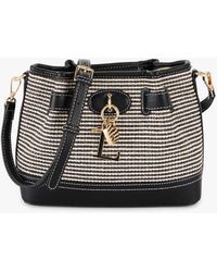 Lollipops - Sac Bandouliere Sac porté épaule noir Petula - Lyst