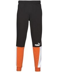 PUMA - Trainingsbroek Ess+ Block Sweatpant Tr - Lyst