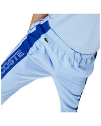 Jogging lacoste bleu clair sale