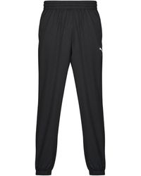 PUMA - Jogging Ess Woven Pants - Lyst