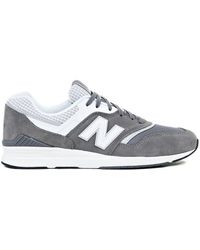 new balance 697 trainers in navy and silver