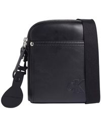 Calvin Klein - Sacoche Sacoche Ref 63214 BEH Noir 17*14*4.5 cm - Lyst