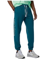 gym en workout voor Trainings New Balance Synthetisch Fc Porto Travel Woven Suit in het Blauw voor heren en joggingpakken Heren Kleding voor voor Kleding voor sport 