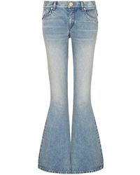 Balmain - Western Flared Jeans With Low Waist - Lyst