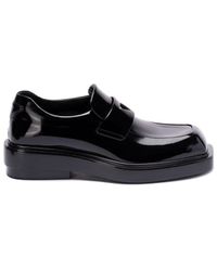 Prada - Triangle-Patch Leather Loafers - Lyst