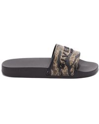 Givenchy - Slide Flat Sandals - Lyst