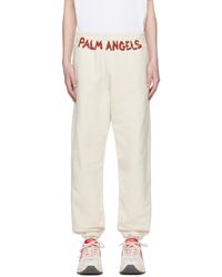 Palm Angels - Pantalon de survêtement blanc cassé à logo modifié imprimé - Lyst