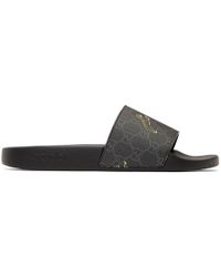 Gucci Sandales noires GG Supreme Pursuit