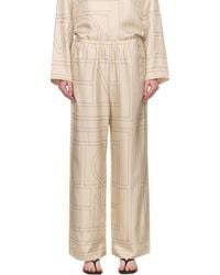 TOTEME - Off- Monogram Silk Pj Lounge Pants - Lyst