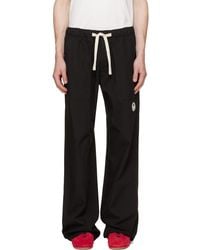 Palm Angels - Tree Logo Loose Trousers - Lyst
