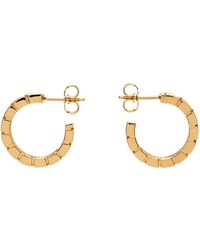 Versace - Boucles d'oreilles à anneau dorées à motif à clé grecque - Lyst