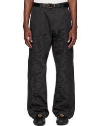 Versace - Jacquard Cotton Carpenter Trousers - Lyst