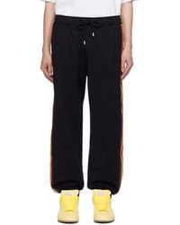 Lanvin - Pantalon de survêtement noir à garnitures curb - Lyst