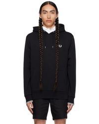 Fred Perry - F perry pull à capuche noir à rayures aux poignets - Lyst