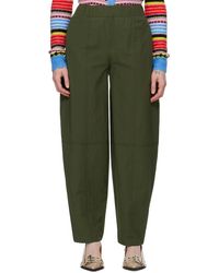 Ganni - Green Curved Trousers - Lyst
