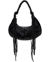 【関税込み】Holzweiler グレー Cocoon Carry ダウン バッグ Holzweiler グレー Cocoon Carry ダウン バッグ グレー | Lyst