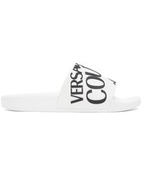 Versace Jeans Couture Denim Jeans Couture Logo Sliders in White Womens Flats and flat shoes Versace Jeans Couture Flats and flat shoes Save 70% 