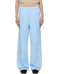 A Bathing Ape - Pantalon De Détente Ample Bleu À Motif Camouflage En Jacquard Et À Plaque À Logo - Lyst