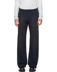 Acne Studios - Fleece Stamp Logo Trousers - Lyst