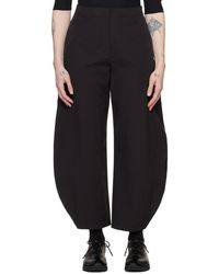 Amomento - Curved Leg Trousers - Lyst