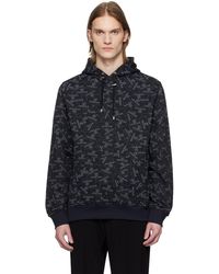 Balmain - All-Over Label Print Hoodie - Lyst