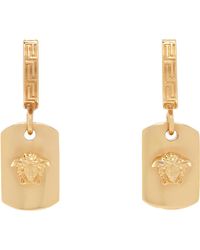 Versace - Boucles d'oreilles à anneau dorées à méduse - Lyst