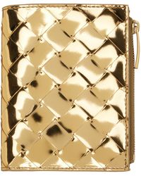 Bottega Veneta - Gold Small Intrecciato Bi-fold Zip Wallet - Lyst
