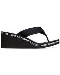 Claquettes à logo imprimé Alexander Wang en coloris Noir Femme Chaussures Chaussures plates Sandales plates 