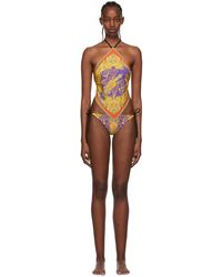 Femme Articles de plage et maillots de bain Articles de plage et maillots de bain Versace Maillot de bain une pièce à imprimé Synthétique Versace en coloris Noir 