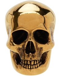 Alexander McQueen Boucle d'oreille dorée à crâne - Noir