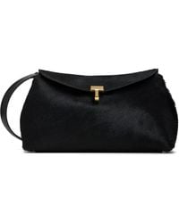 TOTEME - T-Lock Pony Hair Clutch - Lyst