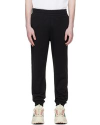 Moncler - Logo Cotton Fleece Track Pants - Lyst