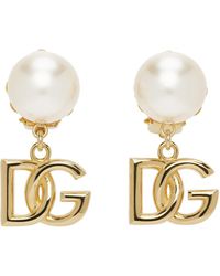 Dolce & Gabbana - Dolcegabbana boucles d'oreilles dorées à logo dg - Lyst