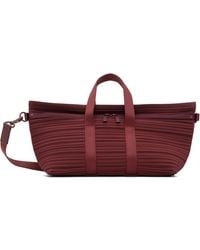 Pleats Please Issey Miyake - Burgundy Pleats Boston Bag - Lyst