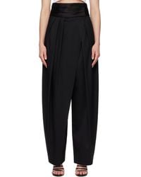 Alaïa - Tux Round Wool Trousers - Lyst