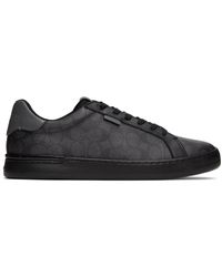 black coach slip ons