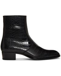 Saint Laurent Bottes embossees facon croco a glissiere noires Wyatt